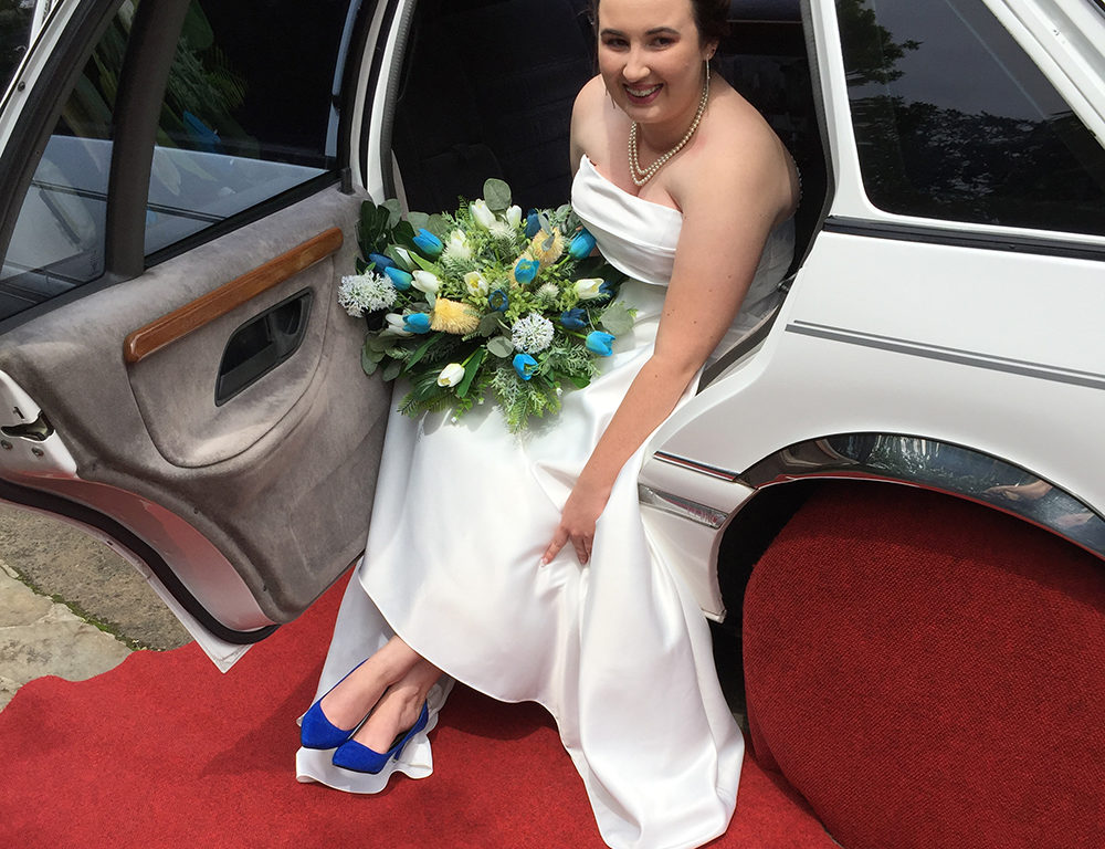 bride with blue shoes